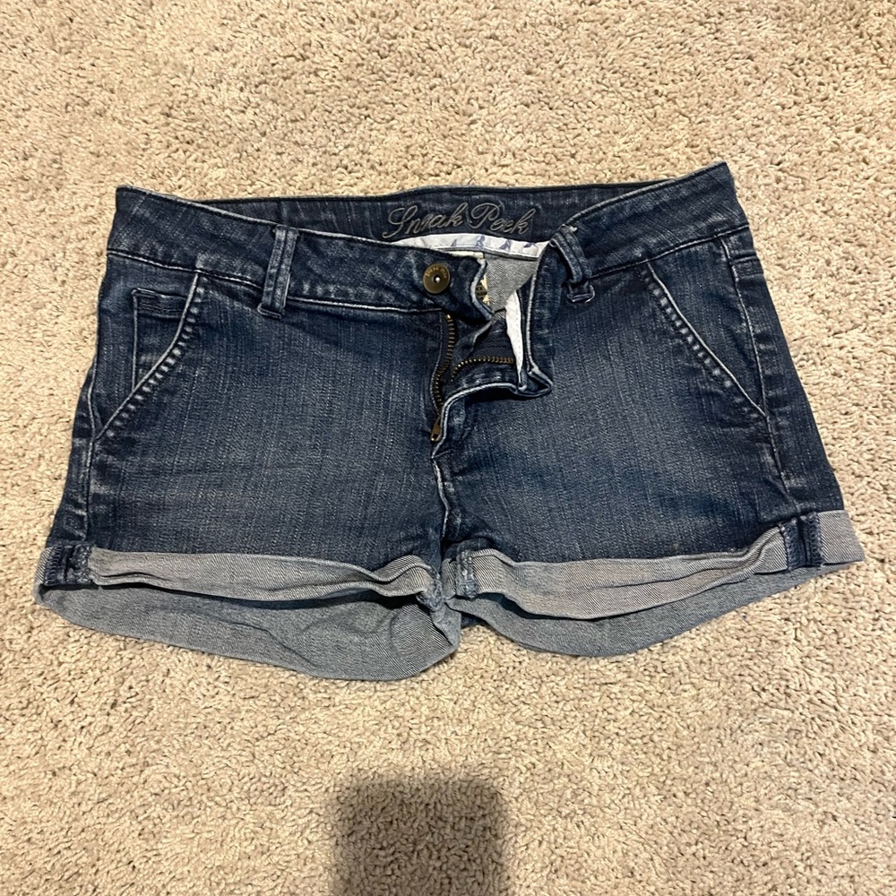 Sneak Peek jean shorts size Medium, fits like a small. Comfy and easy to wear.